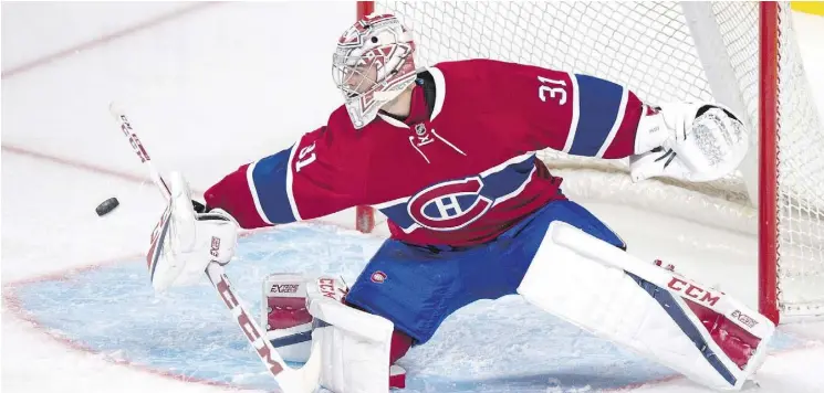  ?? PAUL CHIASSON / THE CANADIAN PRESS / FILES ?? Carey Price has led the Montreal Canadiens to an impressive lead over the Atlantic Division.