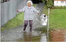  ?? PHOTO: JOHN BISSET/STUFF ?? Moli Williams stands outside her house on Bouverie Street, Timaru, after heavy rain caused surface flooding.