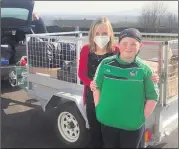  ?? ?? Rachel Kelly (NS principal) and Caoimhe Arnold, pictured with the Ukrainian aid collection, loaded and ready to go!