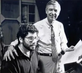  ?? Rogers Communicat­ions ?? Michael Moricz, left, and Fred Rogers.