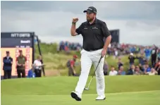  ?? IAN RUTHERFORD / USA TODAY SPORTS ?? Shane Lowry celebrates his birdie on the 15th hole en route to a 63 Saturday at the British Open. Lowry takes a four-shot lead into the final round.