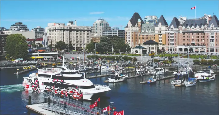  ?? — V2V ?? The V2V Vacations Empress pulls into its Inner Harbour berth in Victoria with the Empress Hotel providing a stately welcome.