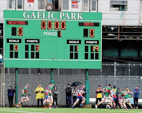  ?? INPHO ?? Lark in the park: The players contest a ball during yesterday’s Connacht SFC quarter-final at Gaelic Park in New York which Mayo won 1-22 to 0-4. Elsewhere, Galway beat London at Ruislip by 0-16 to 1-9