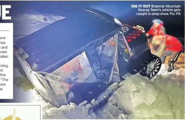  ?? ?? DIG IT OUT Braemar Mountain Rescue Team’s vehicle gets caught in deep show. Pic: PA