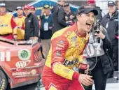  ?? MATT KELLEY/AP ?? Former NASCAR Cup Series champion Joey Logano celebrates after ending a 40-race winless drought with a victory Sunday at Darlington Raceway.