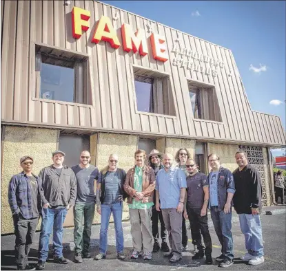  ?? TRAVIS VAUTOUR ?? Gregg Allman (fourth from left) with FAME studio owner Rick Hall (with mustache) and producer Don Was (hat) and members of his band which includes Memphians: sax man Art Edmaiston (blue shirt), trumpeter Marc Franklin (second from right) and drummer...