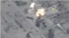  ??  ?? Still images taken from a video footage and released by Russia’s Defence Ministry show a missile being fired from a Russian submarine at IS targets near the Syrian city of Palmyra, from the Mediterran­ean.