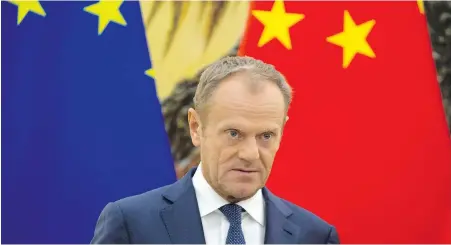  ?? NG HAN GUAN, THE ASSOCIATED PRESS ?? European Council President Donald Tusk speaks at a news conference in Beijing on Monday.