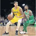  ?? ELISE AMENDOLA/AP ?? Los Angeles Lakers forward Kyle Kuzma (0) is wearing Nike’s latest performanc­e basketball shoes, which from concept to reality, took about three years to put together.