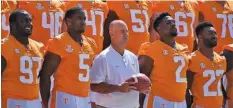  ?? STAFF PHOTO BY DAVID COBB ?? Tennessee football coach Jeremy Pruitt poses for a team photograph on Aug. 5 at Neyland Stadium. Pruitt will make his debut as a head coach today when the Vols face West Virginia in Charlotte, N.C.
