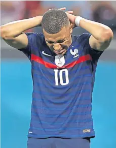  ??  ?? AGONY: France’s Kylian Mbappe missed a vital penalty.