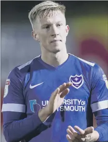  ??  ?? WELL BEATEN Ross McCrorie applauds Pompey’s supporters