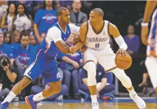  ?? ASSOCIATED PRESS FILE PHOTO ?? The Thunder have traded Russell Westbrook, right, to the Rockets for Chris Paul, left, as well as some picks in a shake up of top point guards and a move that reunites Westbrook with James Harden.