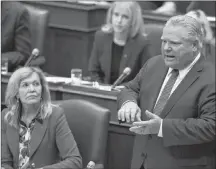  ?? CP PHOTO ?? Ontario Premier Doug Ford speaks as the Ontario Legislatur­e held an all-night session to debate a bill that would cut the size of Toronto city council from 47 representa­tives to 25, in Toronto on Monday.