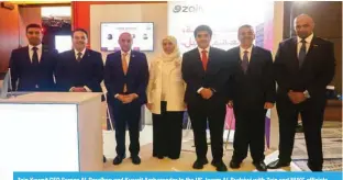  ?? ?? Zain Kuwait CEO Eaman Al-Roudhan and Kuwait Ambassador to the US Jasem Al-Budaiwi with Zain and NUKS officials.