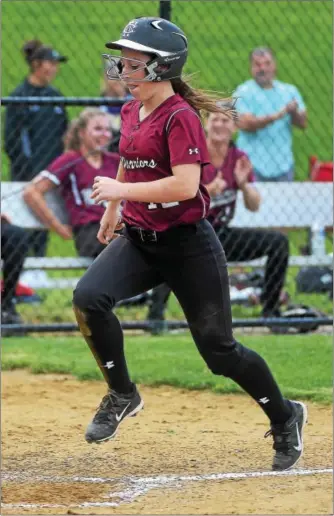  ?? PETE BANNAN — DIGITAL FIRST MEDIA ?? All the Way: Henderson’s Brooke Matonti (scores against Kennett Friday afternoon. The Warriors came back from an 8-1 deficit to win 9-8.