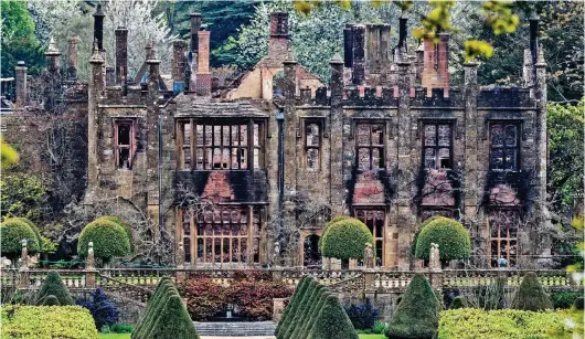  ??  ?? Gutted: Parnham House in Dorset after the blaze – the family had spent £10million revamping the Grade I listed building