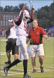  ?? Photos by Gail Conner and Kevin Myrick ?? Trevon Wofford celebrates a touchdown