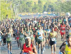  ?? /Veli Nhlapo (See Back Page) ?? Record: The 25th edition of the Old Mutual Soweto Marathon was run on Sunday, with SA’s Irvette van Zyl winning the women’s 42.2km race for the second year running and setting a record of 2:33:43. The men’s title was won by Ethiopian Sintayehu Legese Yinesu.