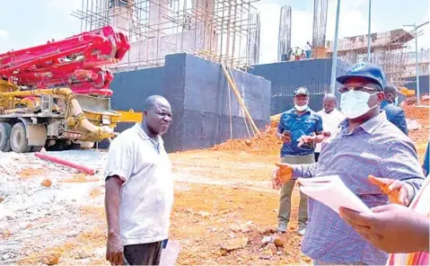  ?? ?? Governor Dave Umahi on inspection of a bridge