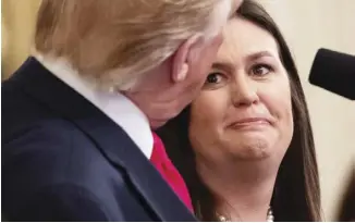  ??  ?? Outgoing White House Press Secretary Sarah Huckabee Sanders speaks alongside US President Donald Trump during a second chance hiring and criminal justice reform event in the East Room of the White House in Washington on Thursday.