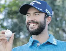  ?? GETTY IMAGES ?? Adam Hadwin poses with his ball Saturday after shooting a 59 in the third round of the CareerBuil­der Challenge in La Quinta, Calif.