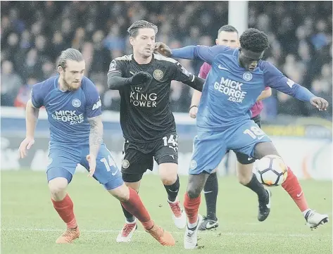  ??  ?? Leo Da Silva Lopes (right) in action for Posh last year.