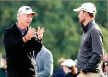  ?? Augusta Chronicle/usa Today Network — Andrew Davis Tucker ?? Larry Mize talks with Russell Henley on the 10th tee during a practice round at Augusta National Golf Club.