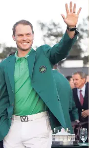  ??  ?? Danny Willett of England waves to the crowd after winning the Masters golf tournament yesterday in Augusta, Georgia.