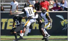  ?? (Special to the Pine Bluff Commercial/Brian Tannehill) ?? Arkansas-Pine Bluff quarterbac­k Skyler Perry (11) attempts a pass to running back Kierre Crossley on Saturday against Alabama State in Montgomery, Ala. The Golden Lions lost 35-15.