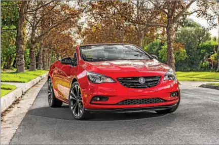  ??  ?? Unlike many convertibl­es,the Sport Red 2017 Cascada retains the proportion­s of the roofline instead of having to “hunch up” to accommodat­e the necessary mechanisms.