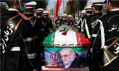  ?? Photograph: Wana News Agency/Reuters ?? Members of Iranian forces carrying the coffin of Iranian nuclear scientist Mohsen Fakhrizade­h during a funeral ceremony in Tehran on Monday.