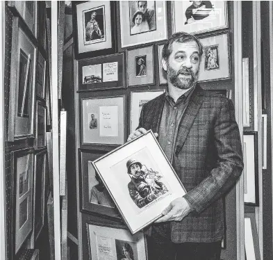  ?? DEVIN YALKIN / THE NEW YORK TIMES ?? Judd Apatow, an autograph buff in addition to being a television show producer and comedian, began collecting signatures at age 9 and never stopped, though he knows it is “a very obscure dad hobby.”