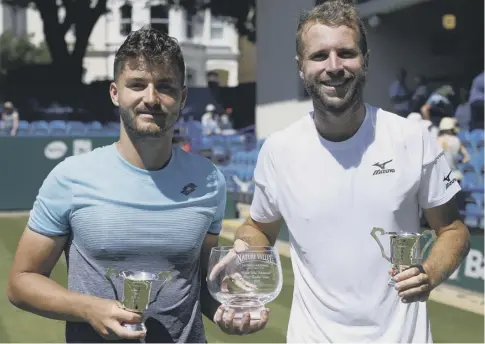  ??  ?? Doubles pair Jonny O’mara, left, and Luke Bambridge after winning their first-ever ATP Tour title in Eastbourne yesterday.