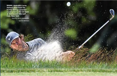  ?? PHOTO: ROSS KINNAIRD/ GETTY IMAGES ?? RISING: Australia’s Lucas Herbert plays from the bunker during a practice round prior to the US Open at Shinnecock Hills Golf Club, New York.