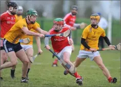  ??  ?? Paddy Lynch makes a break for Louth.