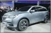  ?? Stan Honda/afp-getty Images ?? Acura’s MDX Prototype reflects gains in aerodynami­c efficiency.