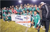  ?? ADOLPHE PIERRE-LOUIS/JOURNAL ?? The Albuquerqu­e High boys celebrate after winning the 5A championsh­ip game against Hobbs at the Santa Ana Pueblo soccer complex.