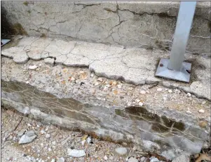  ?? Jeanne Huber/Washington Post ?? Crumbled concrete steps to this 30-year-old home’s porch are a result of years of drainage problems and would give the handiest of handymen nightmares. But fear not, this is only cosmetic damage and not a structural problem.