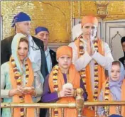  ??  ?? AT SANCTUM SANCTORUM The Trudeau family paying obeisance at the holiest shrine of the Sikhs. HT PHOTO