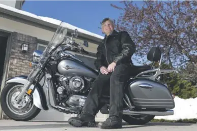  ??  ?? Wes Cook sits on his motorcycle Tuesday while wearing the leather jacket that was given to him by Cody Crosby’s family. Cook, who was battling liver cancer, received a transplant from Crosby, who died in an auto accident. Cook is an avid motorcycli­st, as was Crosby. John Leyba, The Denver Post