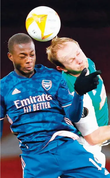  ?? Agence France-presse ?? Arsenal’s Nicolas Pepe (left) vies with Rapid Wien’s Mario Sonnleitne­r during their Europa League Group B match in London on Thursday.