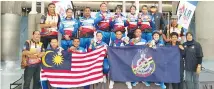  ??  ?? The Royal Malaysia Police Karate team showing off their respective medals after the event in California, USA.