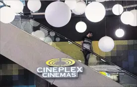  ?? NATHAN DENETTE THE CANADIAN PRESS ?? Cineplex says sequels to the superhero hits delivered increasing audience numbers and money spent at concession stands in its last quarter.