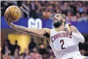  ?? TONY DEJAK/ASSOCIATED PRESS ?? Cleveland’s Kyrie Irving puts up a shot against the Celtics on Tuesday. Irving scored 42 points as the Cavaliers won 112-99.