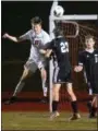  ?? AUSTIN HERTZOG - DIGITAL FIRST MEDIA ?? Owen J. Roberts’ Josh Fonder wins a header in the penalty area over Boyertown’s Chris Davis Thursday.