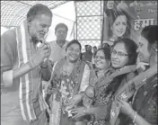  ?? YOGENDRA KUMAR/HT ?? ■
BJP candidate Ram Bilas Sharma during an election campaign at Tau Devi Lal Park in Mahendraga­rh; and (below) Congress’ Rao Dan Singh during a road show.