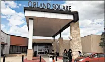  ?? TED SLOWIK/DAILY SOUTHTOWN ?? Shoppers wearing face masks leave Orland Square Mall Friday after it reopened with shorter hours and more safety protocols.