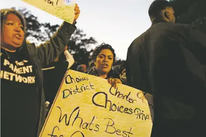  ?? LYNSEY WEATHERSPO­ON/NEW YORK TIMES FILE PHOTO ?? Charter school supporters protest before a November Democratic presidenti­al primary debate in Atlanta. President Donald Trump’s proposed budget would dissolve the standalone charter school fund.