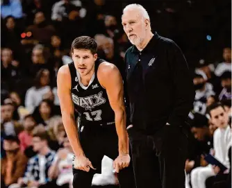  ?? Darren Abate/associated Press ?? The Spurs traded forward Doug Mcdermott, left, to the Pacers as part of a three-team deal that also involved the 76ers. Mcdermott ranked third on the Spurs in total 3-pointers made with 76.